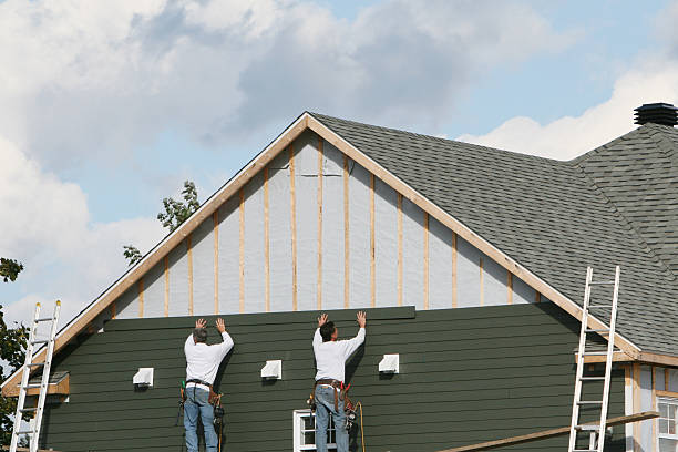 Professional Siding technician working in Aurora, IL